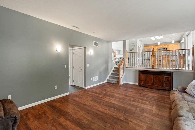 1212 S Drummond Rd, Greenacres, WA 99016 - living area featuring wood finished floors, stairway, and baseboards