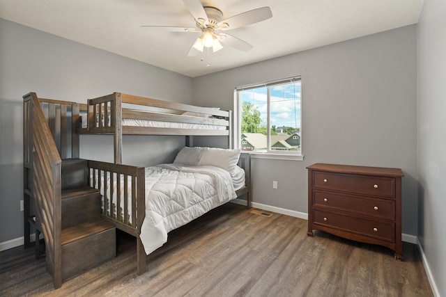 1212 S Drummond Rd, Greenacres, WA 99016 - bedroom with baseboards, wood finished floors, and ceiling fan