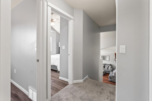 1212 S Drummond Rd, Greenacres, WA 99016 - hallway with baseboards and dark carpet