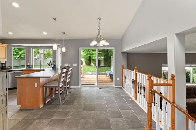 1212 S Drummond Rd, Greenacres, WA 99016 - kitchen with dishwasher, a sink, recessed lighting, a kitchen breakfast bar, and baseboards