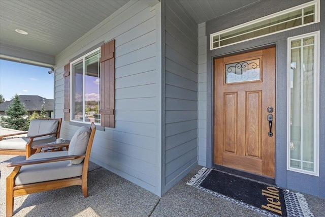 696 W Basalt Ridge Dr, Spokane, WA 99224 - doorway to property featuring covered porch
