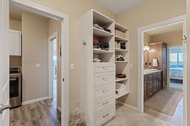 696 W Basalt Ridge Dr, Spokane, WA 99224 - closet with washer / clothes dryer and a sink