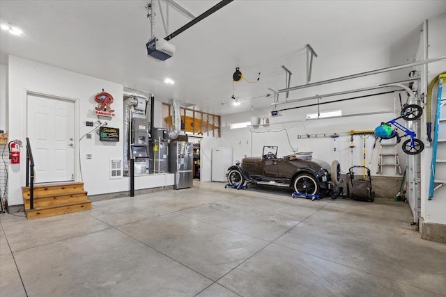 696 W Basalt Ridge Dr, Spokane, WA 99224 - garage with a garage door opener