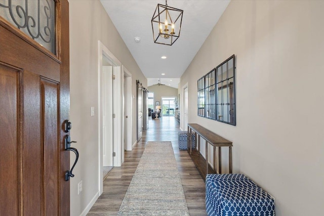 696 W Basalt Ridge Dr, Spokane, WA 99224 - foyer with wood finished floors, a chandelier, baseboards, and recessed lighting
