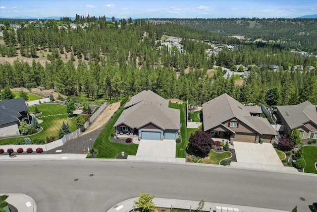 696 W Basalt Ridge Dr, Spokane, WA 99224 - aerial view of residential area with a heavily wooded area