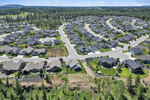 696 W Basalt Ridge Dr, Spokane, WA 99224 - aerial view of property and surrounding area featuring a forest and nearby suburban area