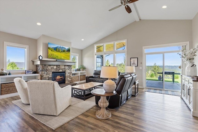 696 W Basalt Ridge Dr, Spokane, WA 99224 - living room with ceiling fan, healthy amount of natural light, beam ceiling, a fireplace, and wood finished floors