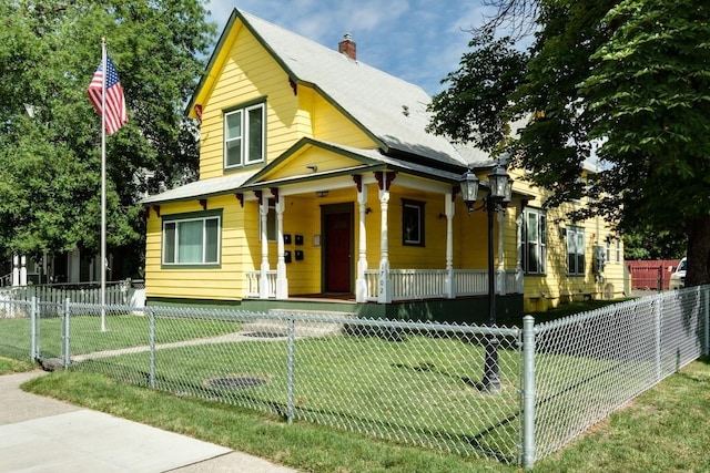 1702 W Dean Ave, Spokane, WA 99201 - view of front facade with a porch and a chimney