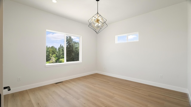8521 W Dahl Rd, Deer Park, WA 99006 - unfurnished room featuring baseboards, light wood-style flooring, and recessed lighting