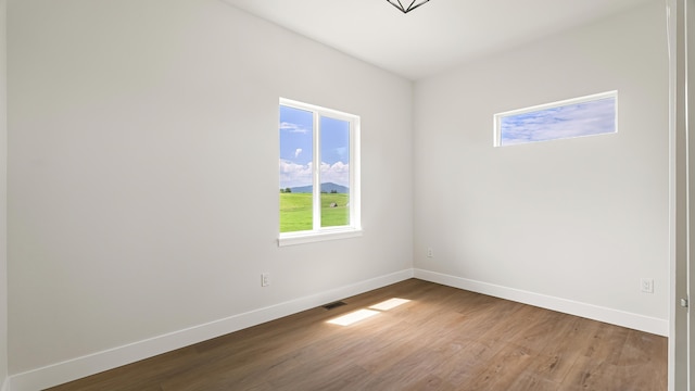 8521 W Dahl Rd, Deer Park, WA 99006 - unfurnished room with baseboards and wood finished floors