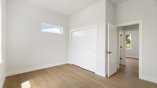 8521 W Dahl Rd, Deer Park, WA 99006 - unfurnished bedroom with light wood-type flooring, baseboards, and a closet