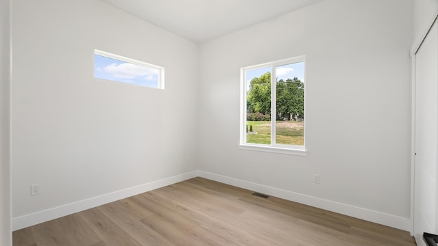 8521 W Dahl Rd, Deer Park, WA 99006 - spare room featuring plenty of natural light, light wood-style floors, and baseboards