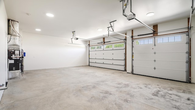 8521 W Dahl Rd, Deer Park, WA 99006 - garage with a garage door opener and recessed lighting