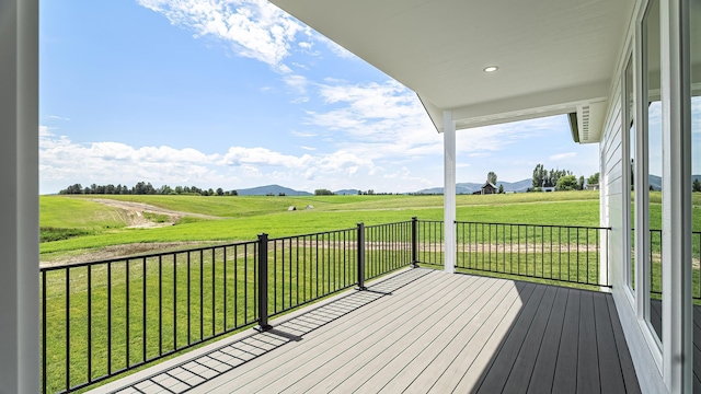 8521 W Dahl Rd, Deer Park, WA 99006 - wooden terrace with a yard, a rural view, and a mountain view