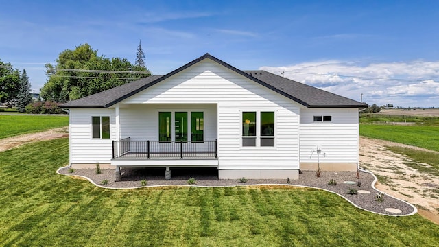 8521 W Dahl Rd, Deer Park, WA 99006 - back of property featuring a yard and roof with shingles