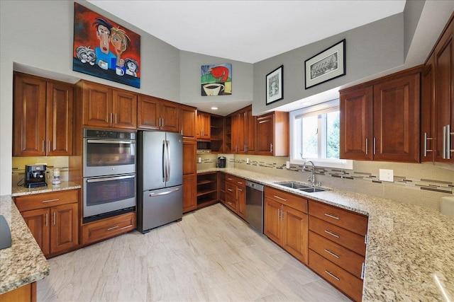 21123 S Cheney Spangle Rd, Cheney, WA 99004 - kitchen featuring appliances with stainless steel finishes, a sink, light stone counters, decorative backsplash, and high vaulted ceiling