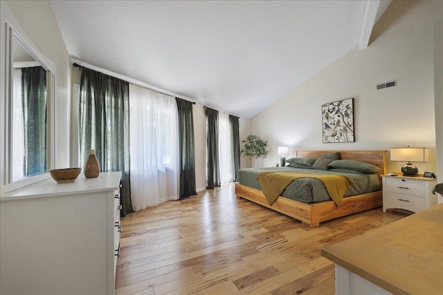 21123 S Cheney Spangle Rd, Cheney, WA 99004 - bedroom with lofted ceiling and light wood-style flooring
