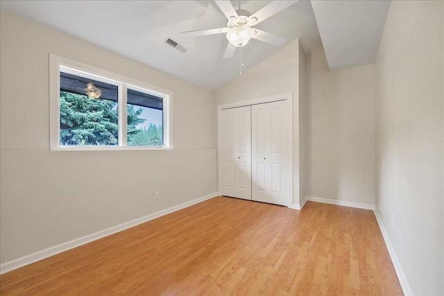 21123 S Cheney Spangle Rd, Cheney, WA 99004 - unfurnished bedroom featuring light wood-style flooring, a closet, lofted ceiling, baseboards, and ceiling fan