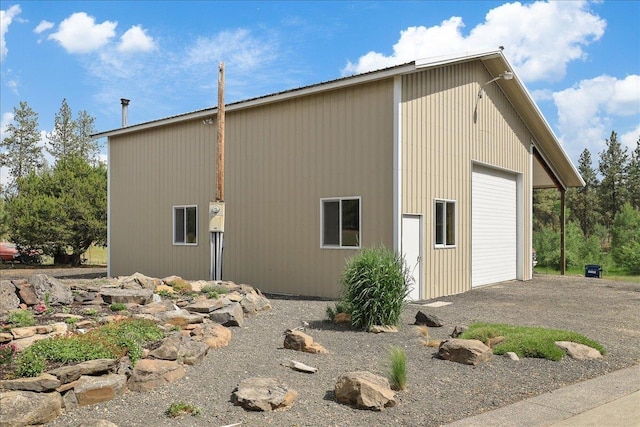 21123 S Cheney Spangle Rd, Cheney, WA 99004 - view of side of home with a detached garage and driveway