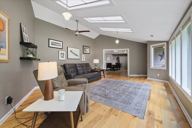 21123 S Cheney Spangle Rd, Cheney, WA 99004 - living area featuring a skylight, light wood-style floors, lofted ceiling, and baseboards