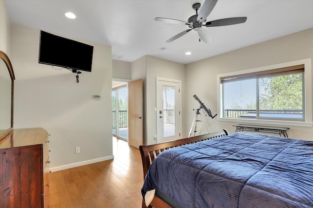 15415 E Timbercrest Ln, Mead, WA 99021 - bedroom featuring multiple windows, hardwood / wood-style floors, baseboards, recessed lighting, and access to exterior