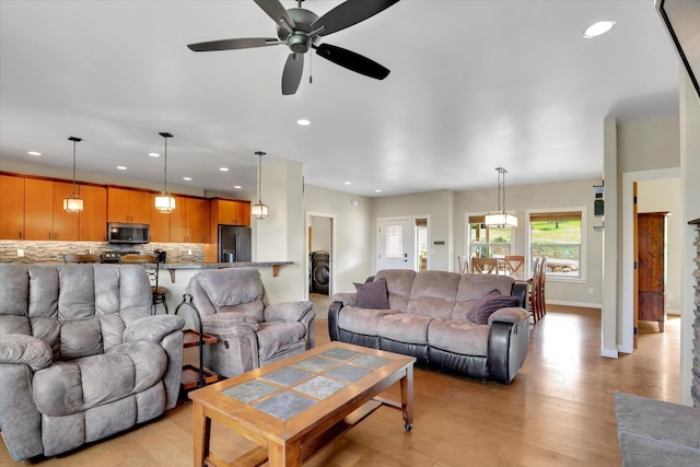 15415 E Timbercrest Ln, Mead, WA 99021 - living room with recessed lighting, ceiling fan, light wood finished floors, and baseboards