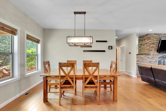 15415 E Timbercrest Ln, Mead, WA 99021 - dining room featuring light wood-style floors, baseboards, a chandelier, and recessed lighting