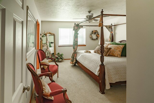 6706 S Moran View St, Spokane, WA 99224 - bedroom featuring carpet flooring, a ceiling fan, a textured ceiling, and baseboards