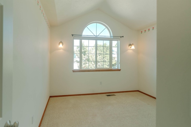 6706 S Moran View St, Spokane, WA 99224 - unfurnished room with healthy amount of natural light, carpet, vaulted ceiling, and baseboards