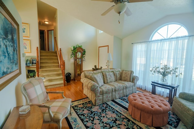 6706 S Moran View St, Spokane, WA 99224 - living area with vaulted ceiling, wood finished floors, stairway, and ceiling fan