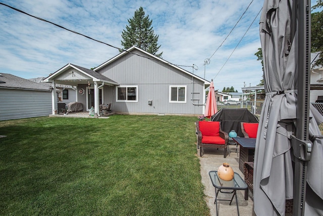 3414 N Lee St, Spokane, WA 99207 - back of house with a yard and a patio