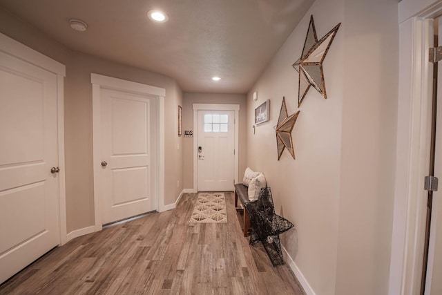 3414 N Lee St, Spokane, WA 99207 - entryway with wood finished floors, baseboards, and recessed lighting