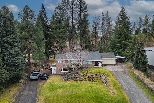 13524 E Nora Avenue 1609 & 1619N Mamer Rd, Spokane Valley, WA 99216 - view of front of home with driveway, a front lawn, and brick siding