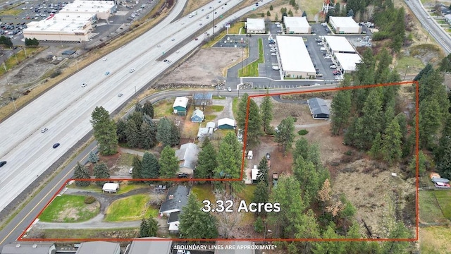 13524 E Nora Avenue 1609 & 1619N Mamer Rd, Spokane Valley, WA 99216 - aerial overview of property's location featuring a major roadway and property parcel outlined