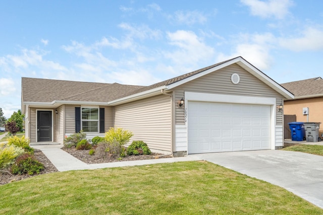 10214 W January Ct, Cheney, WA 99004 - single story home with driveway, an attached garage, a front lawn, and roof with shingles