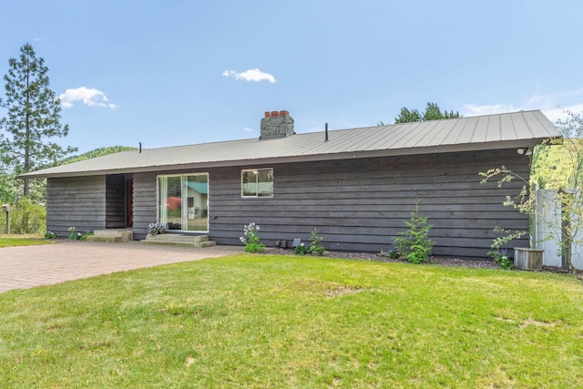 252 Davaz-Carlton Rd, Newport, WA 99156 - back of property with a chimney and a lawn