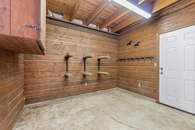 252 Davaz-Carlton Rd, Newport, WA 99156 - bathroom featuring unfinished concrete floors, wooden walls, and wooden ceiling