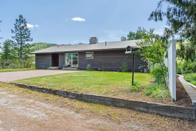 252 Davaz-Carlton Rd, Newport, WA 99156 - ranch-style home featuring a front yard and a chimney