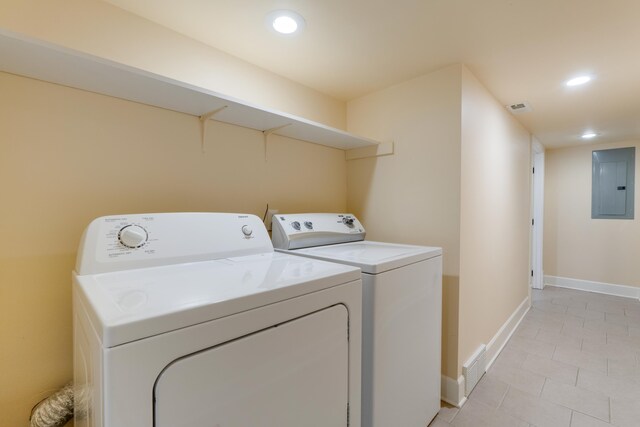 523 S Hatch St, Spokane, WA 99202 - laundry room featuring electric panel, washing machine and clothes dryer, light tile patterned flooring, recessed lighting, and baseboards