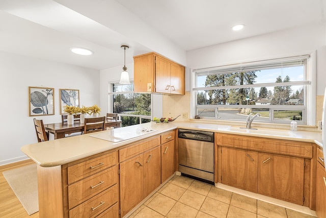 3342 W Riverview Dr, Spokane, WA 99205 - kitchen with dishwasher, white electric cooktop, a peninsula, light countertops, and recessed lighting