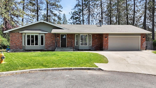 8428 N Susan Ct, Spokane, WA 99208 - ranch-style home with a garage, driveway, a front lawn, and brick siding