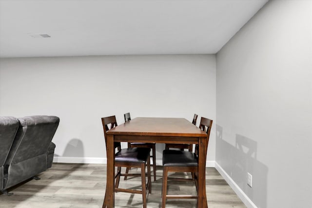8428 N Susan Ct, Spokane, WA 99208 - dining room featuring light wood-type flooring and baseboards