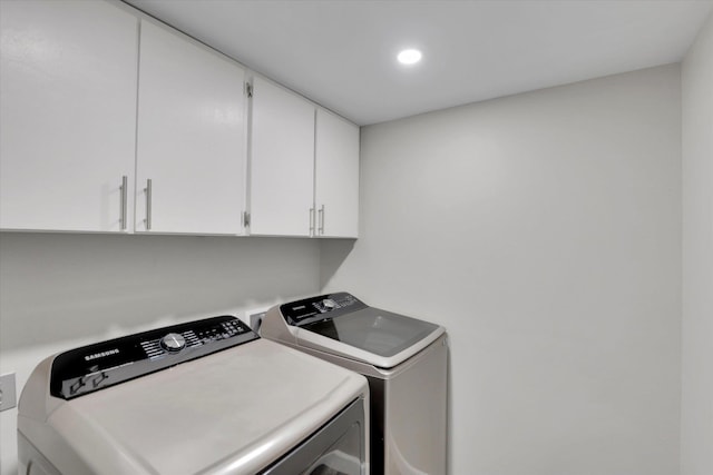 8428 N Susan Ct, Spokane, WA 99208 - laundry area featuring cabinet space, washer and dryer, and recessed lighting