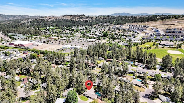 8428 N Susan Ct, Spokane, WA 99208 - aerial view of property's location with a mountain backdrop