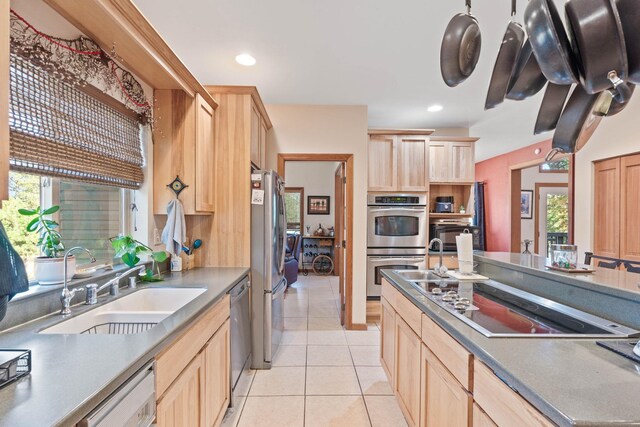 1328 E Smythe Rd, Spangle, WA 99031 - kitchen featuring light brown cabinets, appliances with stainless steel finishes, a sink, light tile patterned flooring, and recessed lighting