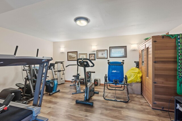1328 E Smythe Rd, Spangle, WA 99031 - workout area with wood finished floors and baseboards