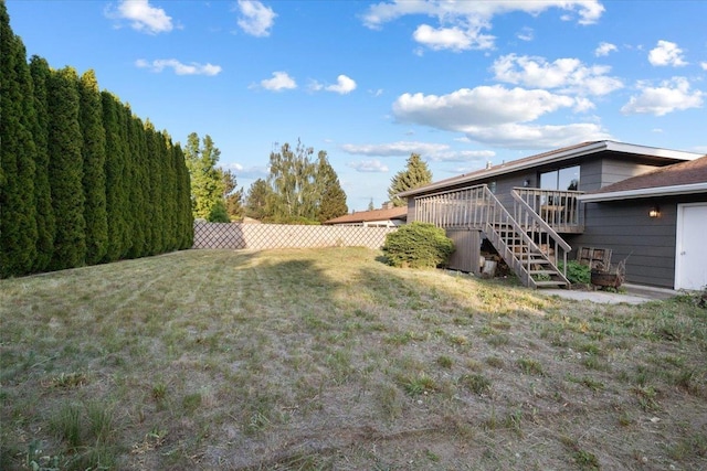 6106 W Kittitas Ct, Spokane, WA 99208 - view of yard with stairs and a deck