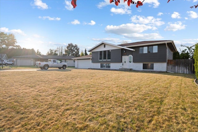 6106 W Kittitas Ct, Spokane, WA 99208 - view of front facade with a garage and brick siding