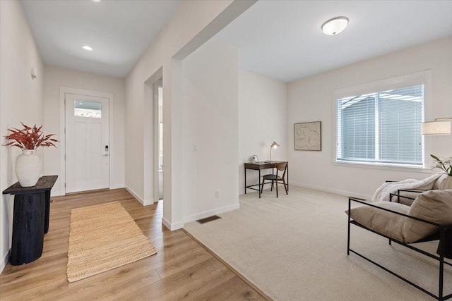4756 W Lex Ave, Spokane, WA 99208 - foyer featuring baseboards, healthy amount of natural light, and light wood-style flooring