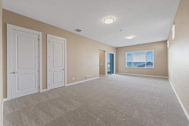 4756 W Lex Ave, Spokane, WA 99208 - unfurnished bedroom with carpet flooring and baseboards